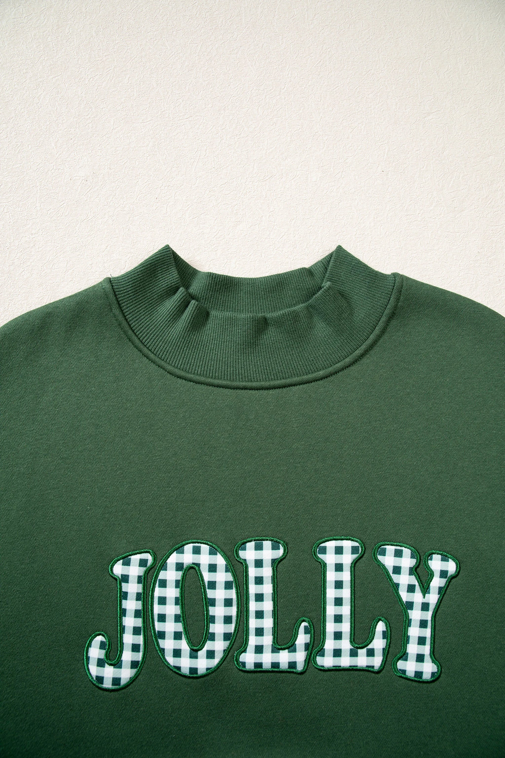 Embroidered Jolly Checkered Mock Neck