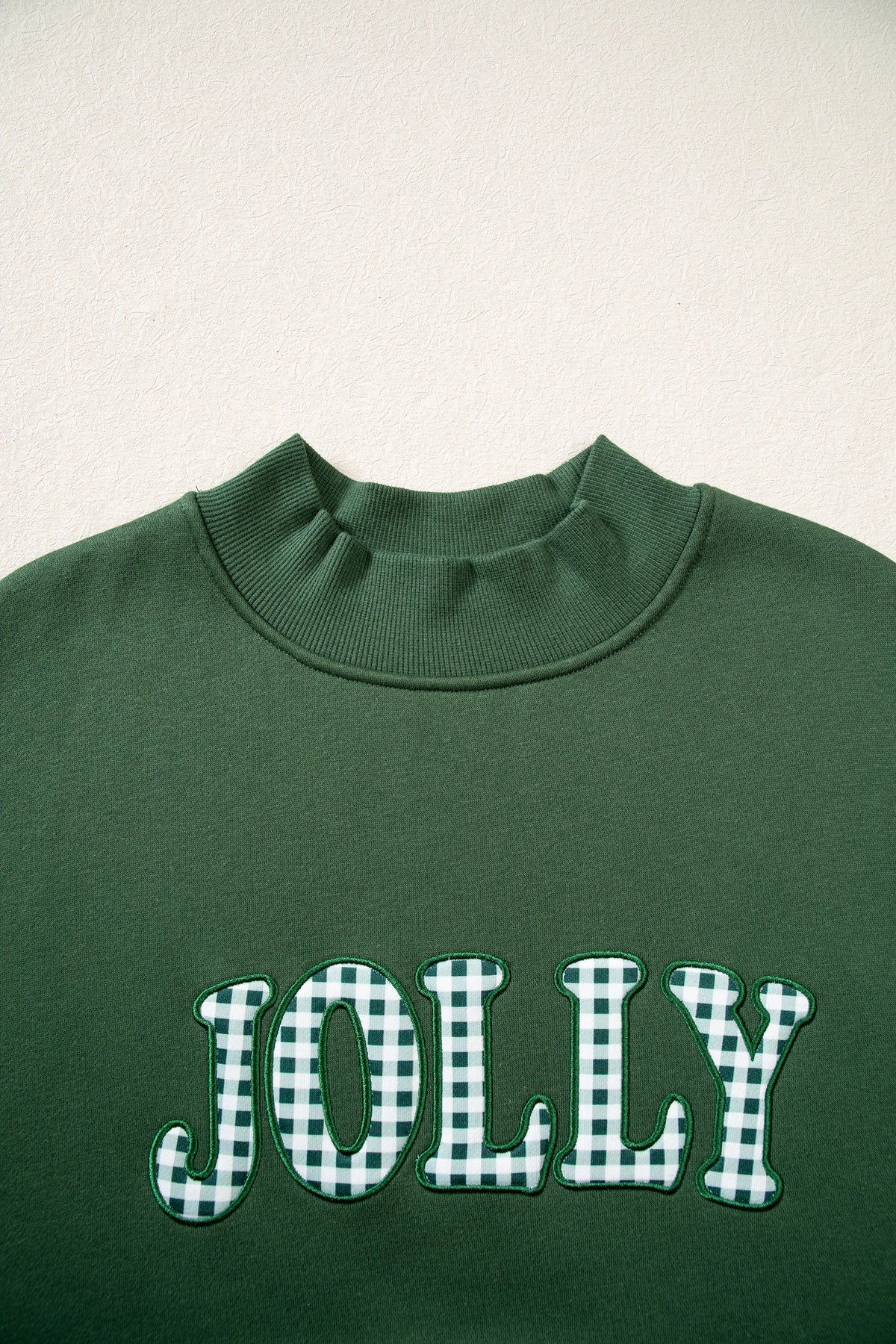 Embroidered Jolly Checkered Mock Neck